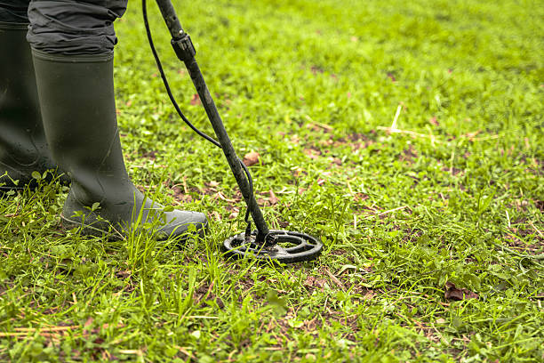 istock Metal Detecting in a Grassy Field 2211669372