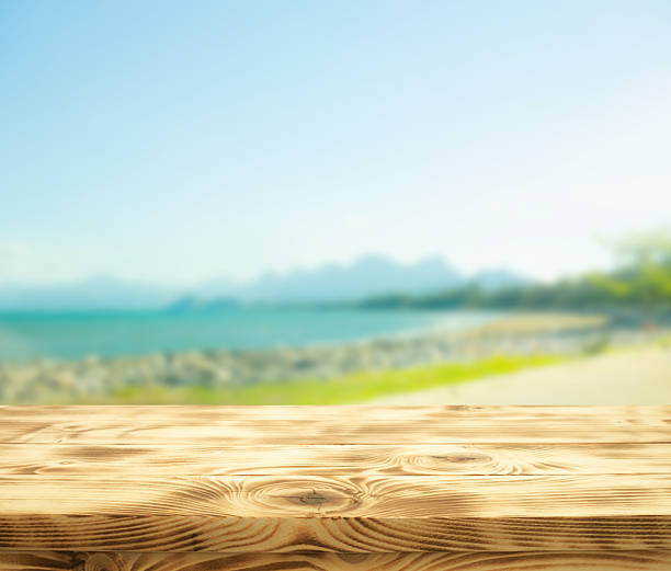istock Beautiful rustic pine wood texture table top on sea landscape or river,lagoon 2211675383