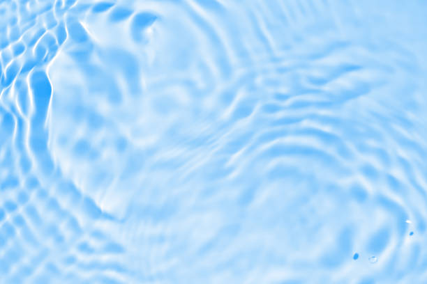 istock Abstract transparent water shadow surface texture natural ripple on blue background 2211676292