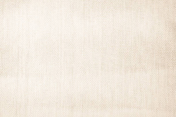 istock Brown sackcloth woven texture background in natural pattern. Jute hessian burlap, linen background in light beige cream color blank. Weaving canvas fiber line cotton cloth textured as organic. 2211676484