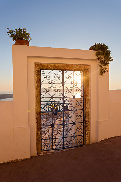 Iconic architecture of Santorini with charming white buildings and scenic Aegean backdrop.