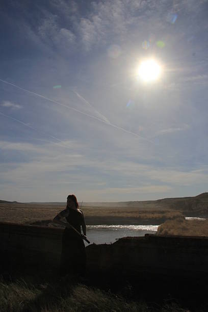 The Strong CJ Practices Her Sword by the River.