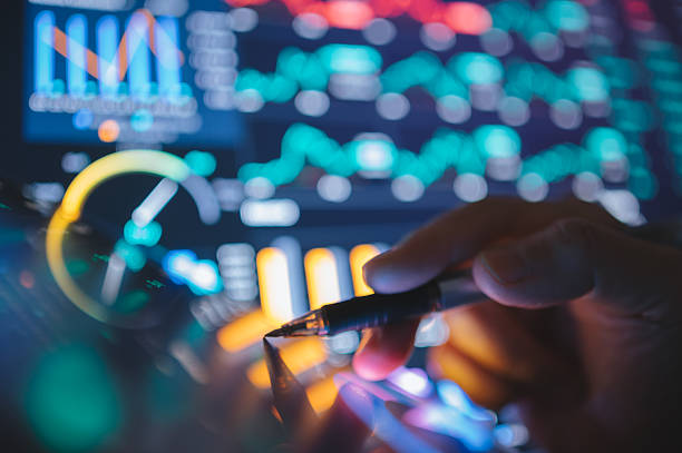 istock fintech user engaging with smartphone and tablet multiple financial dashboards on portable screens simultaneously synchronized trading apps with cryptocurrency analytics 2211689139