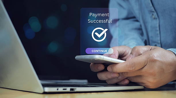 istock Secure online payment, Digital banking, Payment successful, Fintech solutions for seamless transactions and data protection, Online banking, Businessman authorizes an online payment via smartphone. 2211695515