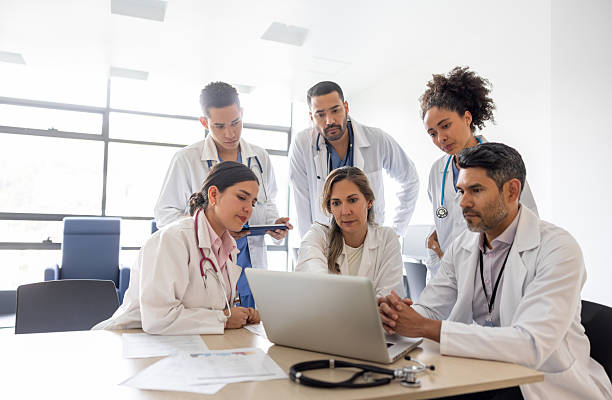 istock Doctors in a meeting looking at test results on a laptop 2211699241