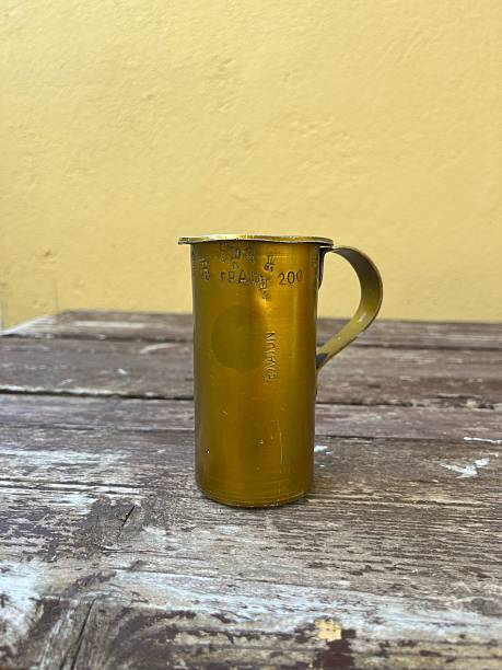 istock Vintage Brass Measuring Cup 2211700026