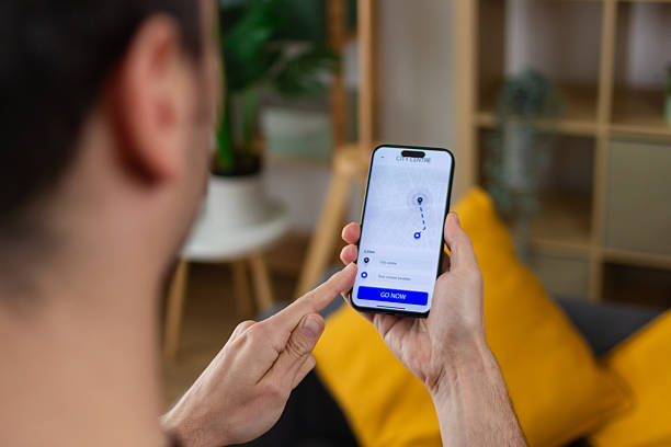 istock Man using navigation app on smartphone to find city center 2211703998