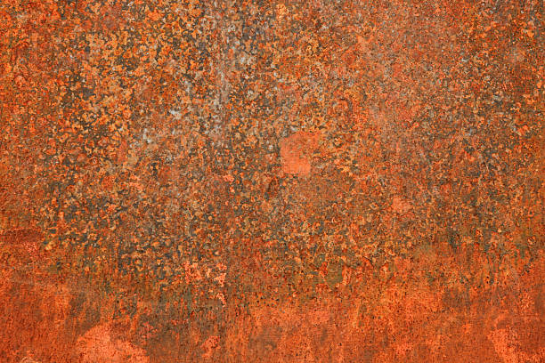 istock Rust and oxidized heavy metal texture. Rusted orange grunge iron background 2211717021