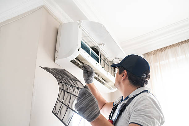 istock Technician with filter of air conditioner 2211719058