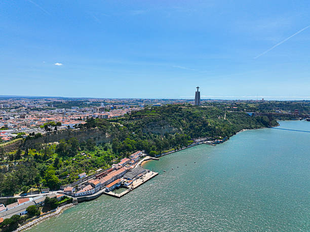 istock Riverside homes and Christ the King statue in background 2211721900