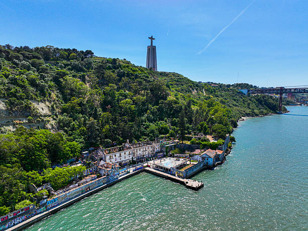Waterfront ruins beneath Christ the King monument