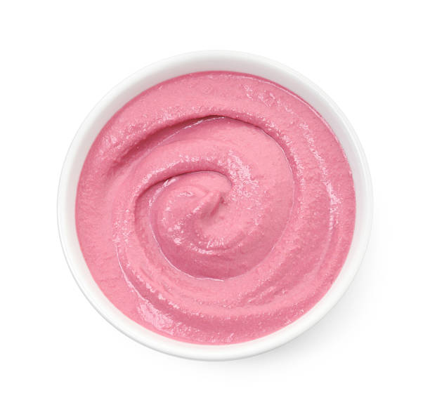 istock Tasty beetroot hummus in bowl isolated on white, top view 2211723795