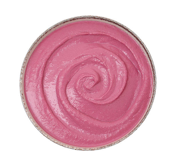 istock Tasty beetroot hummus in bowl isolated on white, top view 2211723818