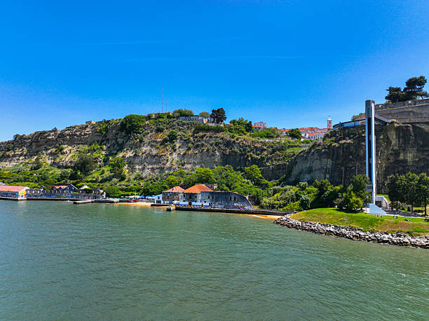 istock Colorful rooftops of Almada and coastal horizon 2211724056