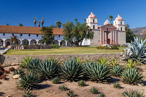 The historic Santa Barbara Mission, known as the Queen of the Missions stands majestically with its Spanish colonial architecture, twin bell towers, and beautiful rose garden