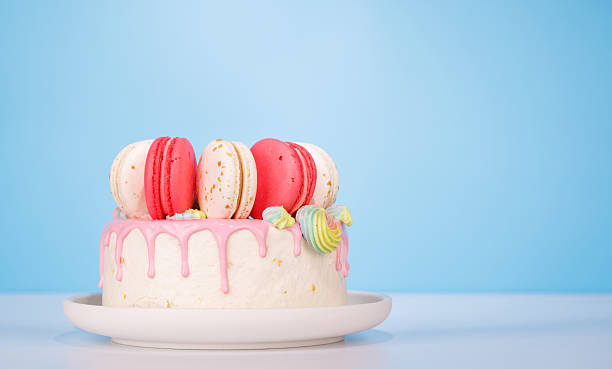 istock A beautifully decorated cake adorned with colorful macarons 2211739128