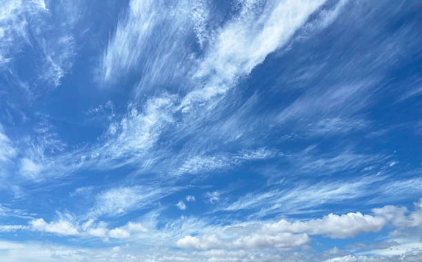 istock Beautiful clouds against a blue sky background. Cloud sky. Cloudy weather, nature concept. 2211739331