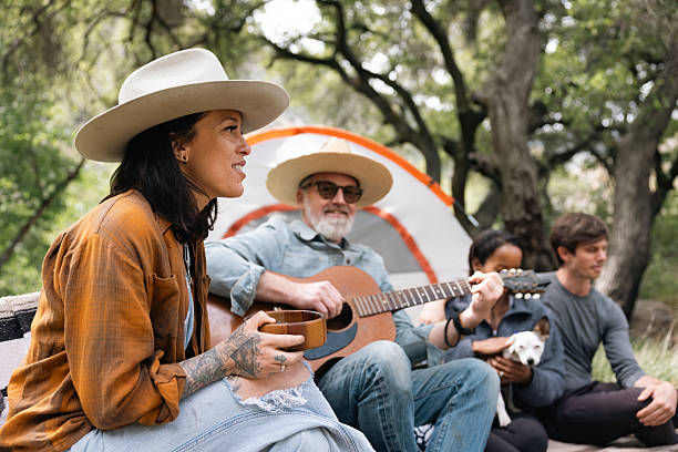 istock Group of multi ethnic friends camping in the forest 2211742563