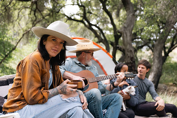 istock Group of multi ethnic friends camping in the forest 2211742581