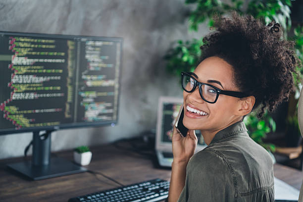 istock Portrait of confident lady server security expert call client modern technology agree modify tips  sit desk in workplace workstation 2211742847