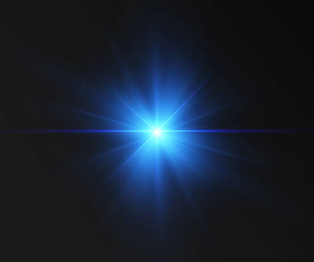 istock A vibrant image of a bright blue light source shining at the center, radiating dynamic beams against a dark background. This striking glow evokes a sense of clarity and depth, ideal for various design 2211743938