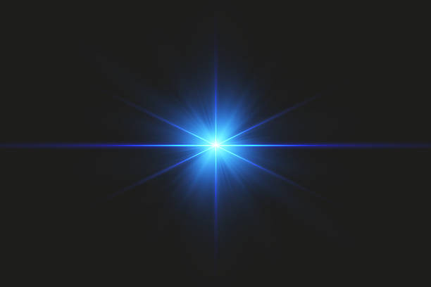 istock A vibrant image of a bright blue light source shining at the center, radiating dynamic beams against a dark background. This striking glow evokes a sense of clarity and depth, ideal for various design 2211744004