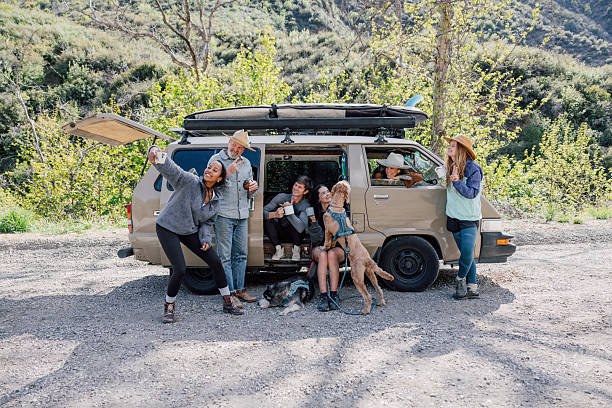 istock Group of multi ethnic friends camping in the forest 2211745909