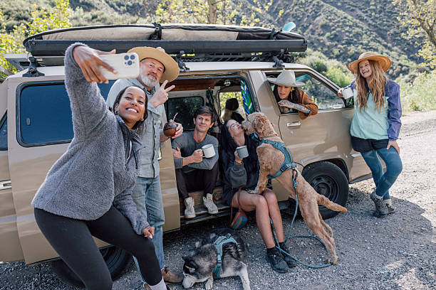 istock Group of multi ethnic friends camping in the forest 2211745949