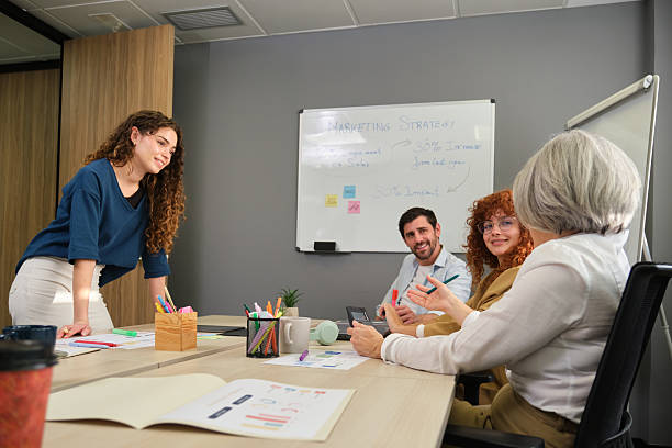 istock Marketing team discussing strategy during meeting in the office 2211747614