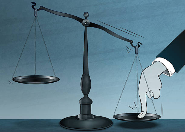 istock Tipping The Scales of Justice 2211749405