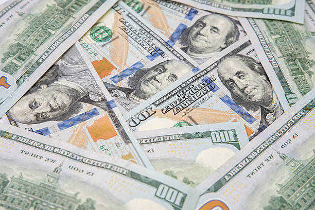 istock Background texture of dollar bills close-up 2211749467