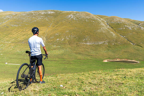 istock Lone man cycling in the mountain 2211752265