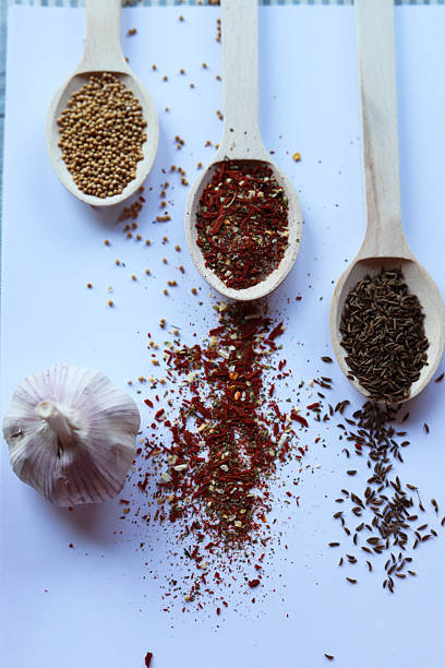 A selection of spices on a stone background