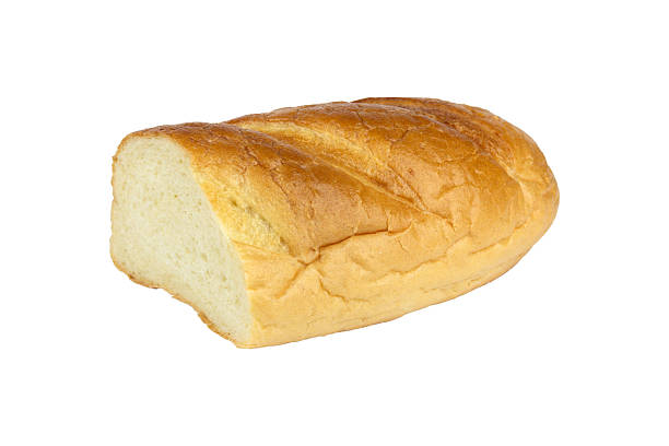 istock loaf, half of fresh bread isolated from background 2211768041