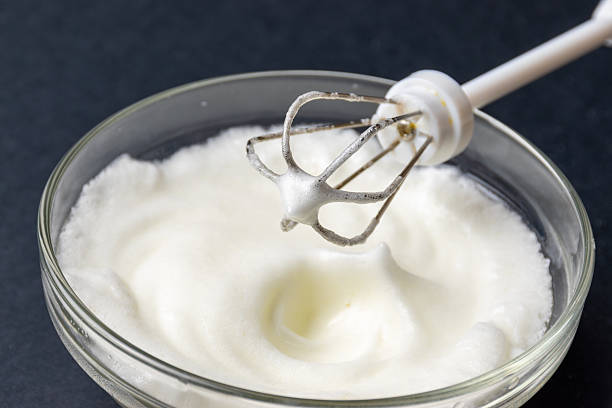 istock Beat an egg whites with mixer 2211768463