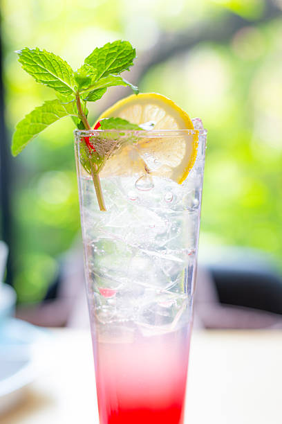 istock Strawberry lemon soda drink,Pink lemonade with lemon, lime and strawberries 2211776466
