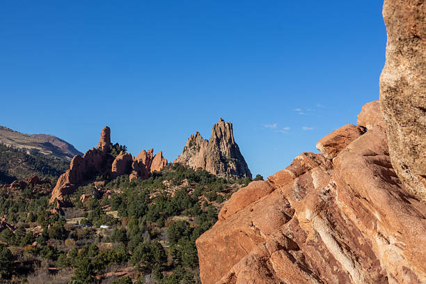 istock Majestic rock formations rise under a bright blue sky in a scenic landscape 2211781172