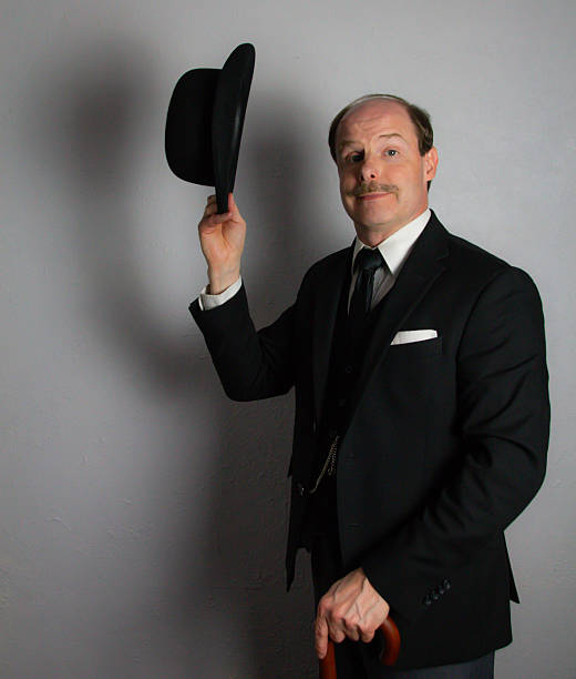 Classic English Gentleman Doffing Bowler Hat
