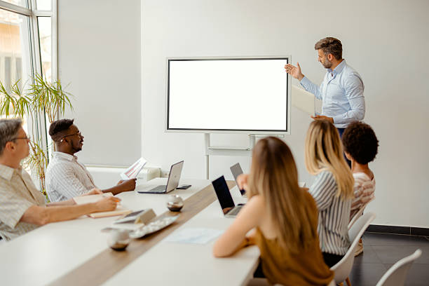 istock Business Planning Meeting with Team and White Screen 2211785253