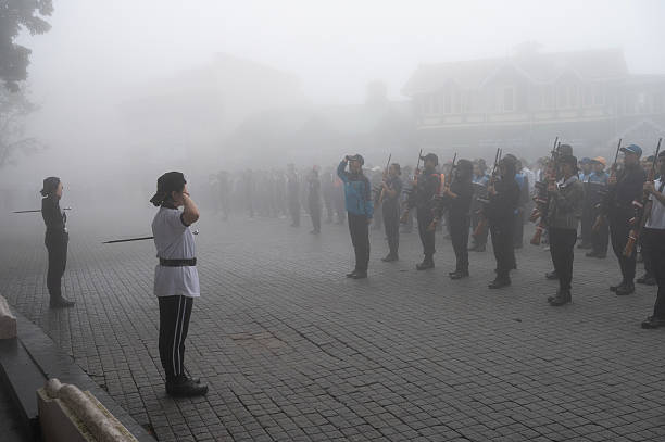 Darjeeling,West Bengal,India -11.08.2023 : Preparation of Independence Day celebration on 15th August 2023. School student cadets marching past at Darjeeling Mall, Military training. Foggy morning.