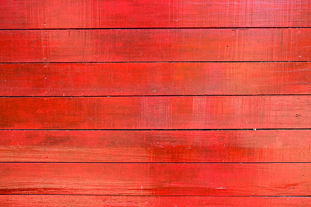 istock Beautiful red wooden house wall for background 2211789256