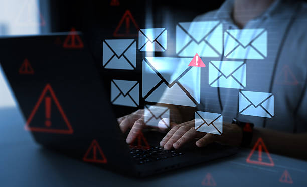 istock Email security and virus spam alert in email. Fake text email scam.Scammers online.Cyber scam. Spam email message on digital screen. 2211794980