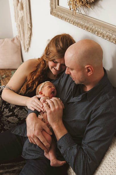 istock Family with Newborn Daughter 2211795689