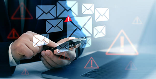 istock Email security and virus spam alert in email. Fake text email scam.Scammers online.Cyber scam. Spam email message on digital screen. 2211796255