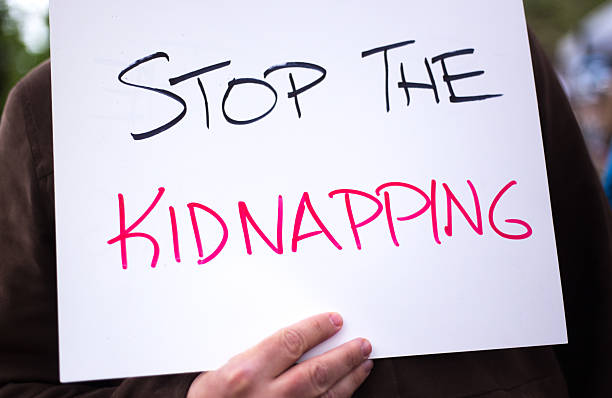 istock Homemade Cardboard Protest Sign: Stop the Kidnapping 2211801213