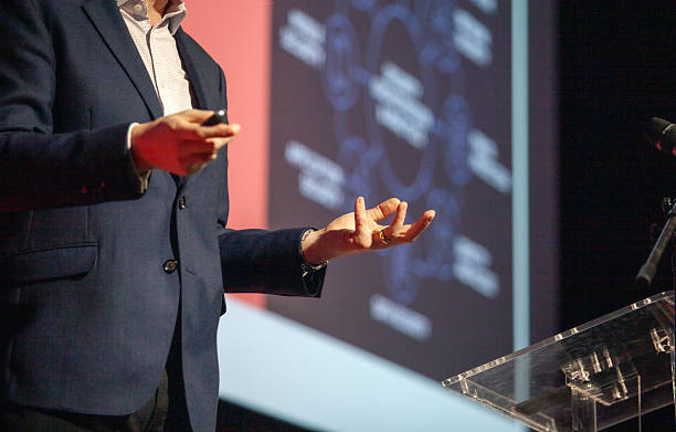 Business conference, corporate presentation, workshop, coaching training, news conference, company meeting, public or political event. Public speaking concept.