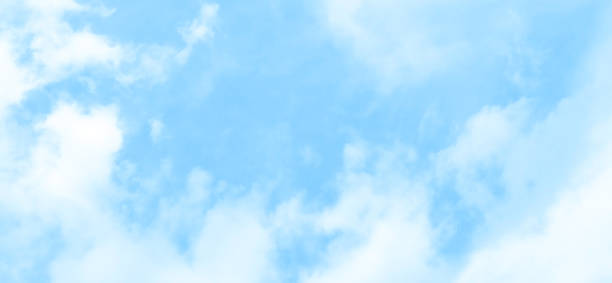 istock Blue pastel sky with white fluffy cloud. Cumulus clouds background. Cloudscape morning sky. 2211808576