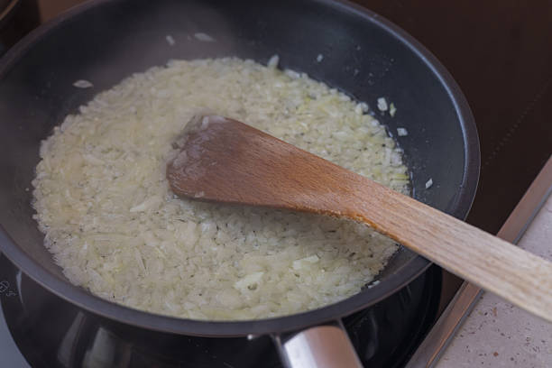 istock Boiled cabbage and fried onion in a pan 2211810909