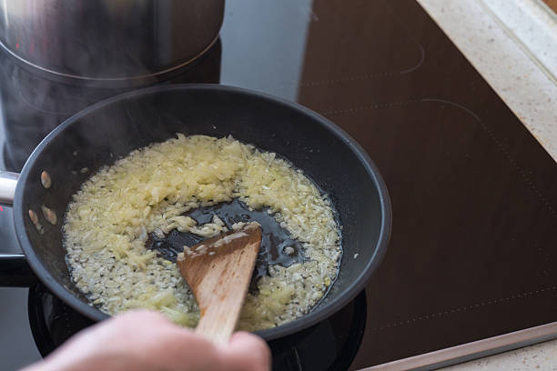 istock Boiled cabbage and fried onion in a pan 2211810933