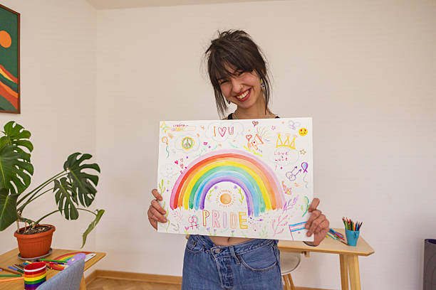 istock Proud Woman with LGBTQ+ Poster 2211811994